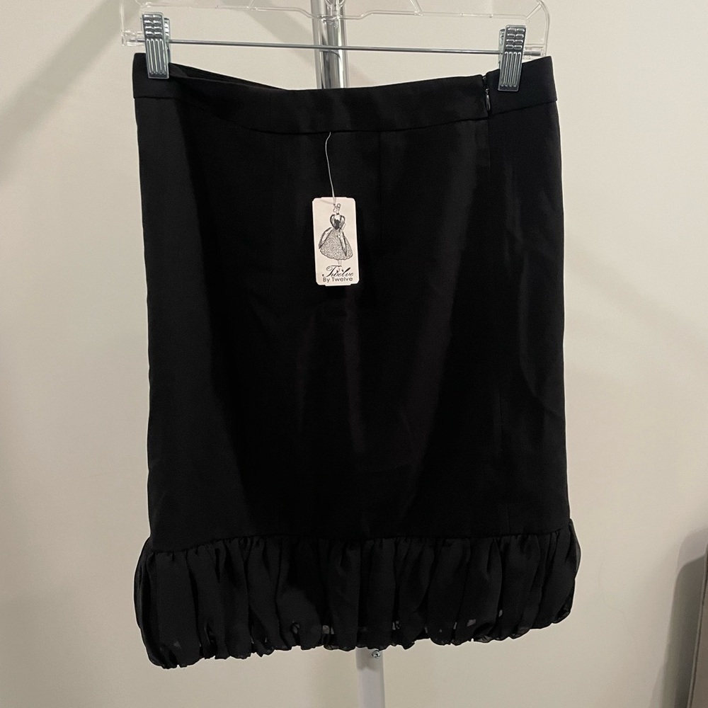 Twelve by twelve black midi skirt